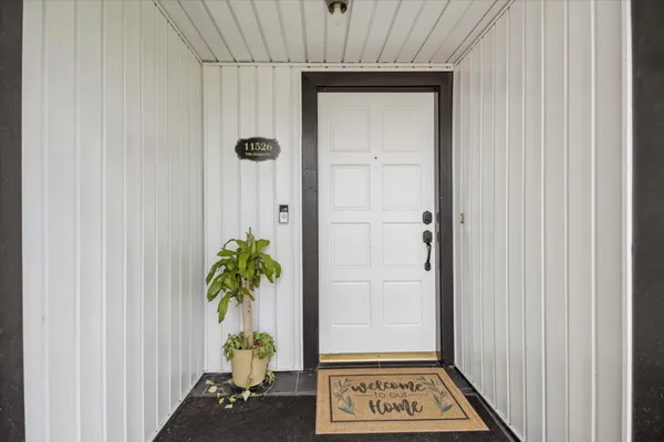a view of a hallway with entryway