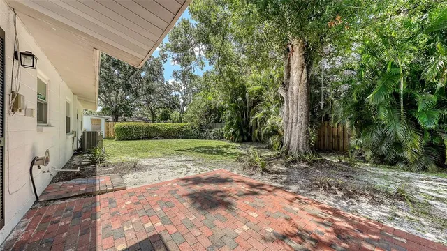 a view of backyard with green space