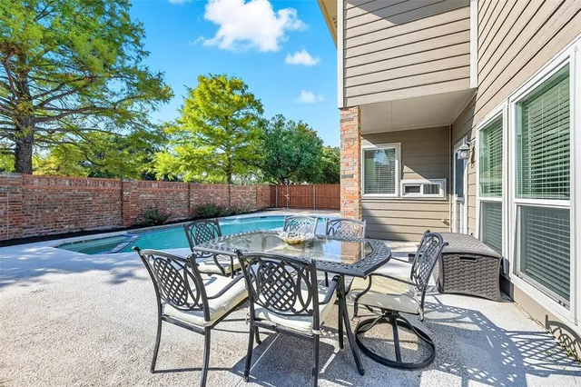 $565,000 | 14613 Woodshadow Lane, Addison, TX 75001