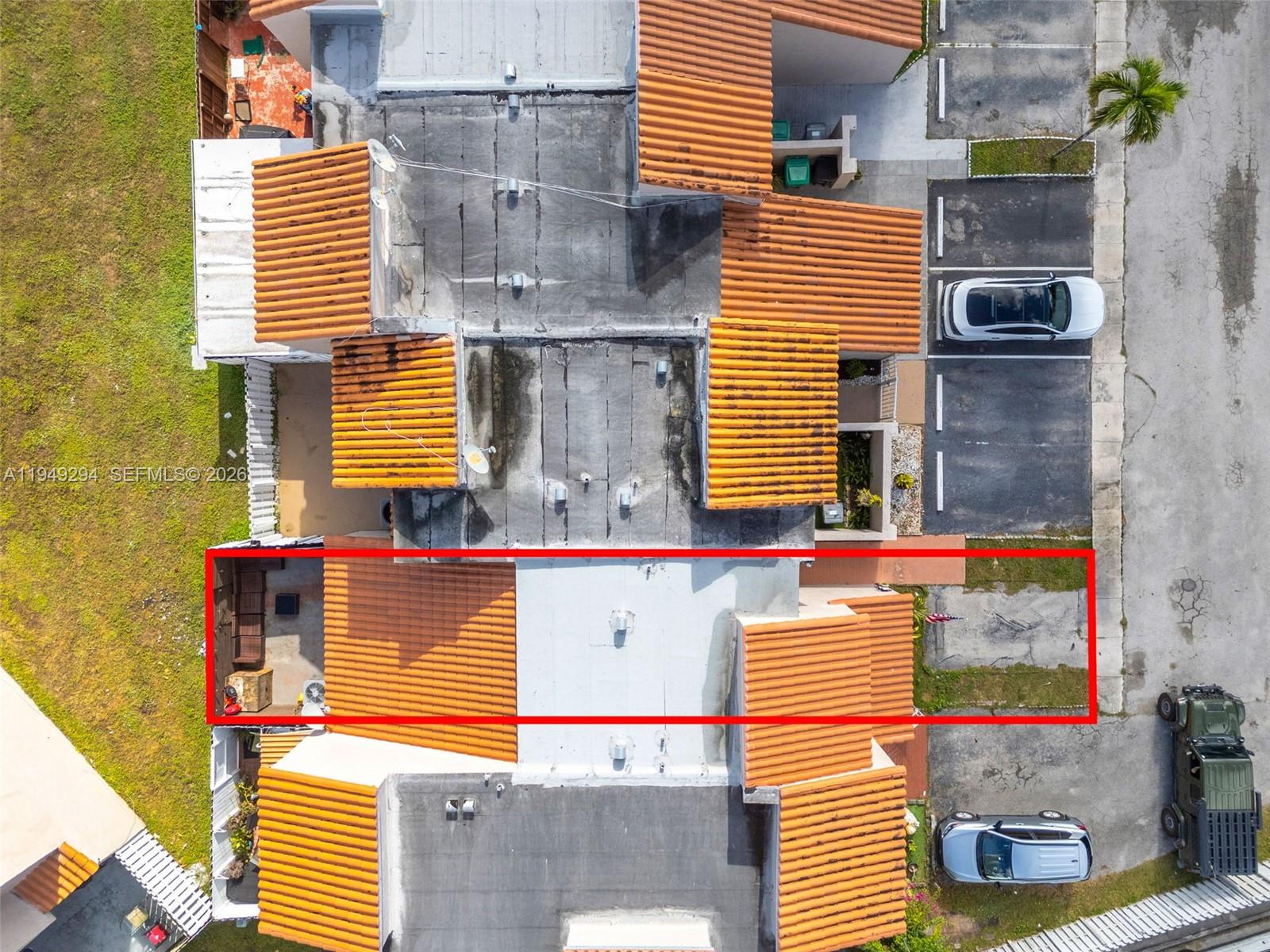 12909 Southwest 64th Lane Miami, FL 33183 - Photo 20 of 35 a view of front door of house and car parked