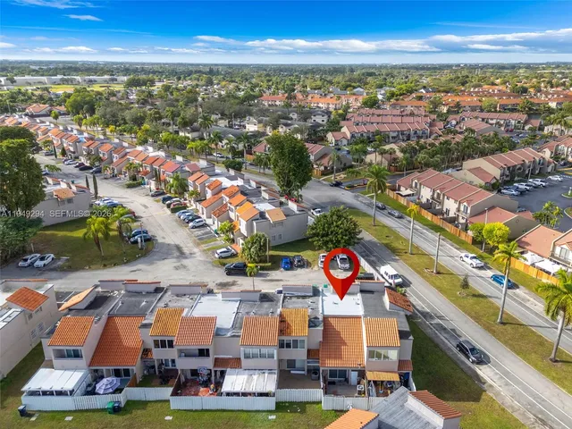 an aerial view of residential building with outdoor space