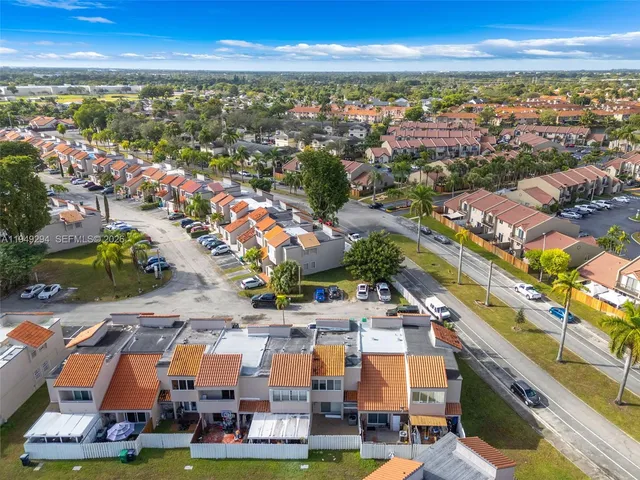 an aerial view of residential building with outdoor space