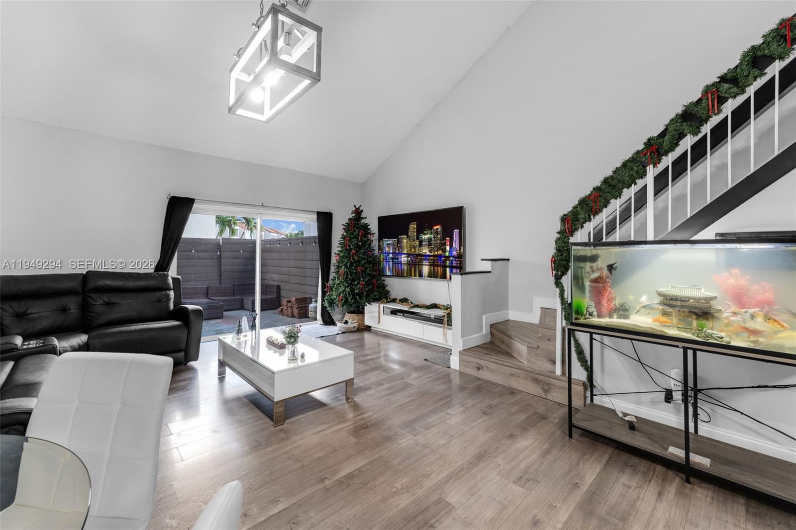 12909 Southwest 64th Lane Miami, FL 33183 - Photo 9 of 35 a living room with furniture