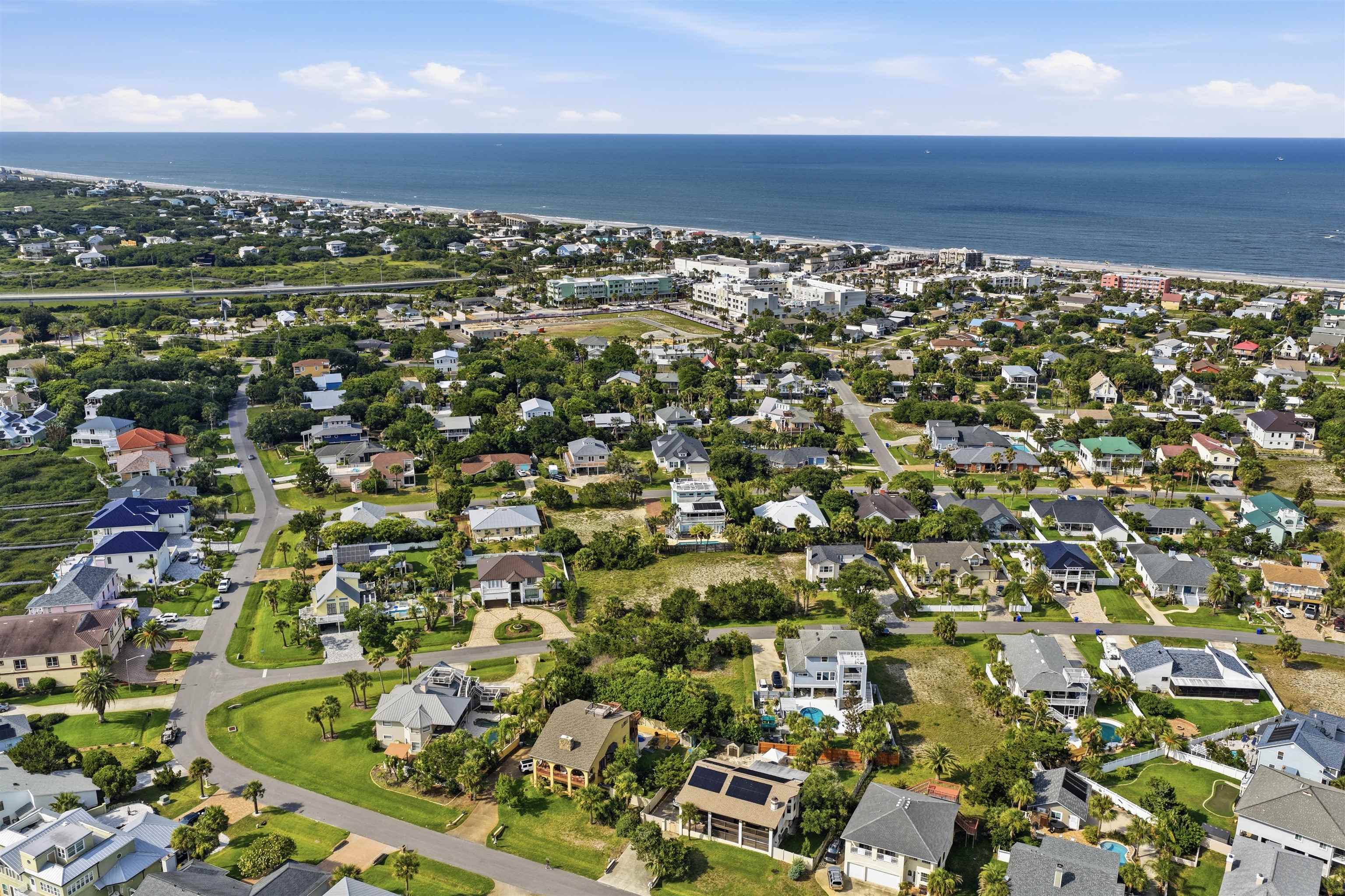203 Sea Turtle Way St. Augustine, FL 32084 - Photo 20 of 22 an aerial view of a house with a yard