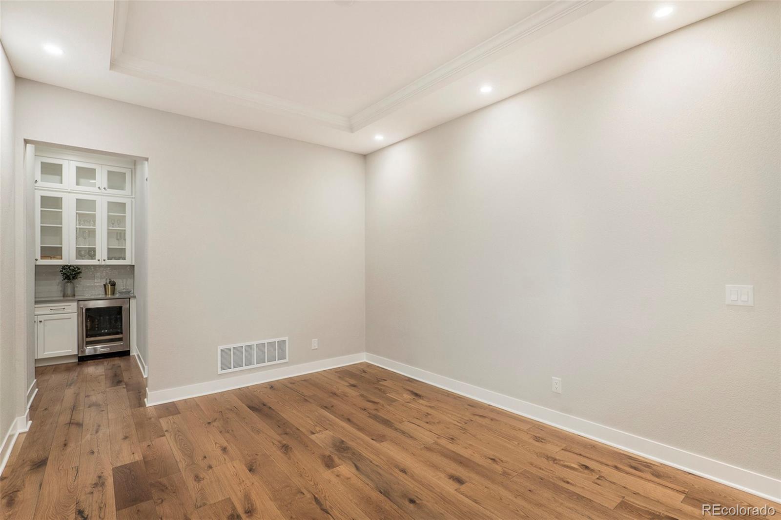 5828 Tesoro Point Parker, CO 80134 - Photo 15 of 43 wooden floor in an empty room