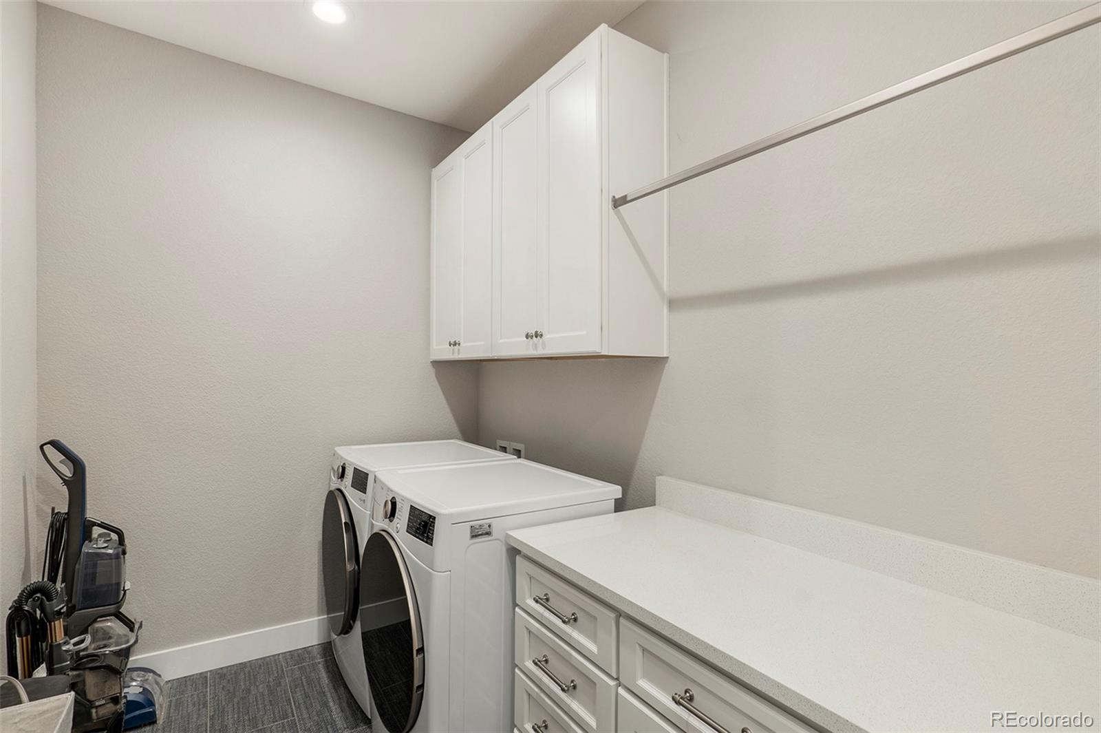 5828 Tesoro Point Parker, CO 80134 - Photo 31 of 43 a utility room with dryer and washer