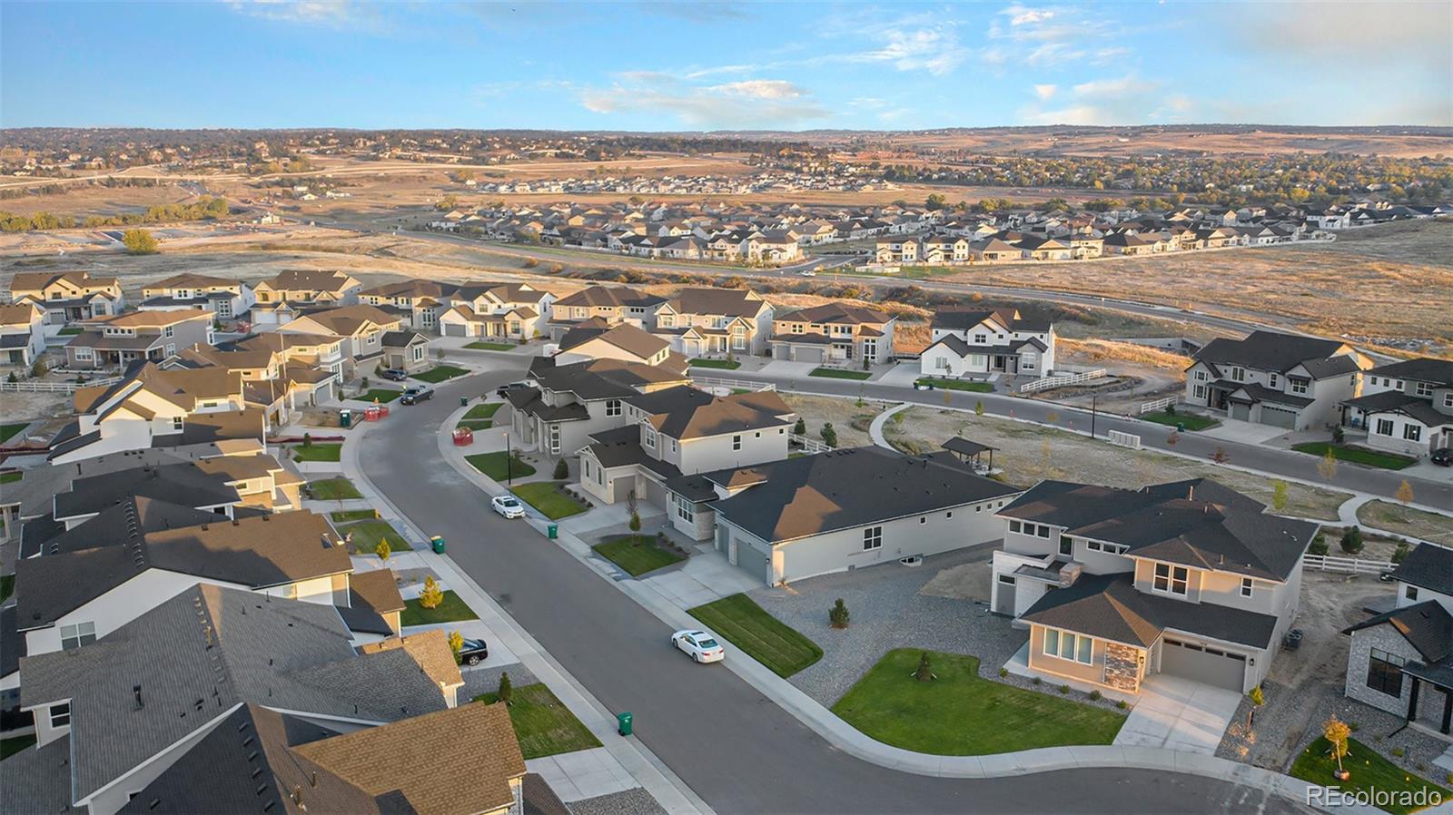 5828 Tesoro Point Parker, CO 80134 - Photo 41 of 43 an aerial view of residential houses with outdoor space