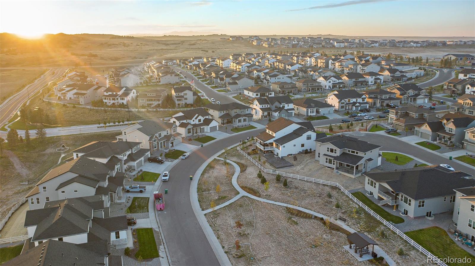 5828 Tesoro Point Parker, CO 80134 - Photo 42 of 43 an aerial view of a city with ocean view