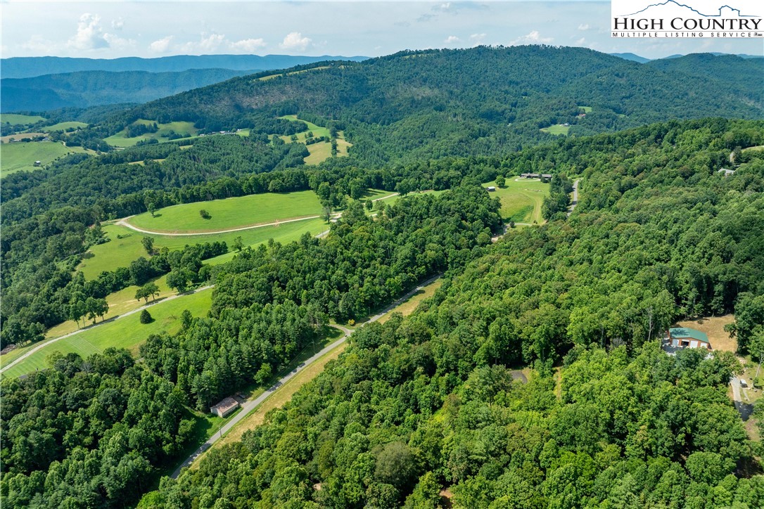 Lot 32 Lake Ridge Butler, TN 37640 - Photo 12 of 30 an aerial view of a house with a yard