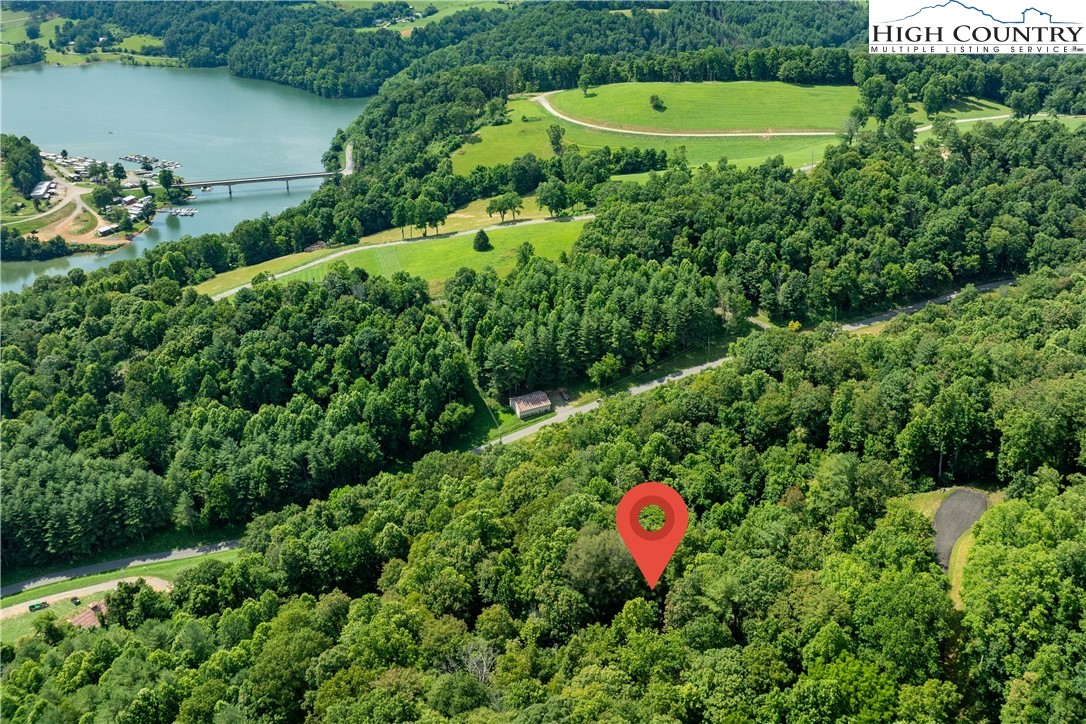 Lot 32 Lake Ridge Butler, TN 37640 - Photo 13 of 30 an aerial view of a house with a yard and lake view