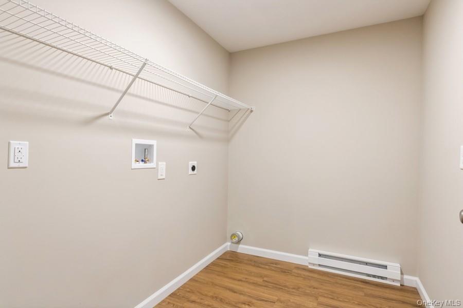 435 State Rte 55 Eldred, NY 12732 - Photo 21 of 26 a view of a room with wooden floor and brick walls