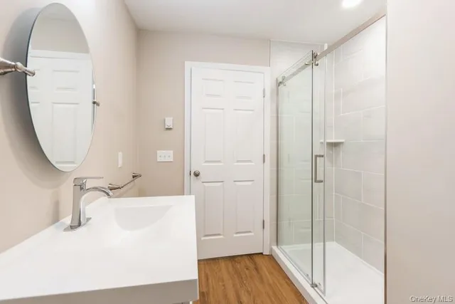 a bathroom with a sink and a mirror