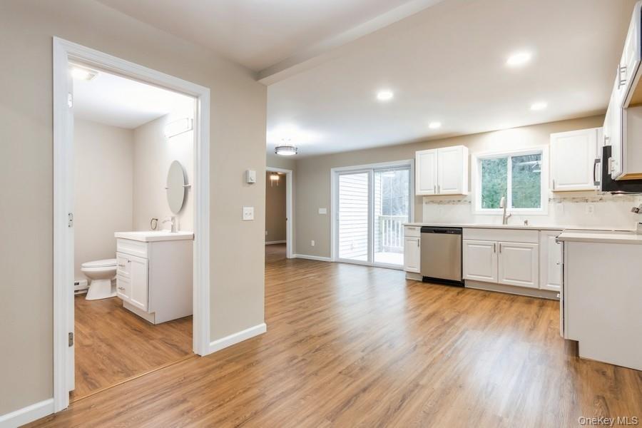 435 State Rte 55 Eldred, NY 12732 - Photo 10 of 26 a view of a kitchen cabinets and wooden floor