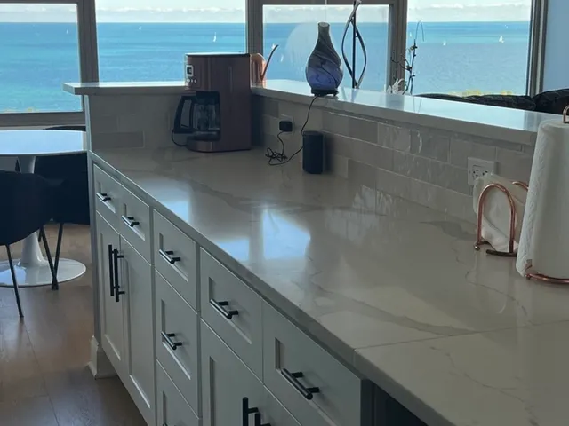 a view of cabinets and wooden floor