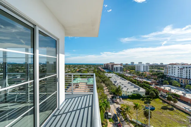 a view of a balcony with city view