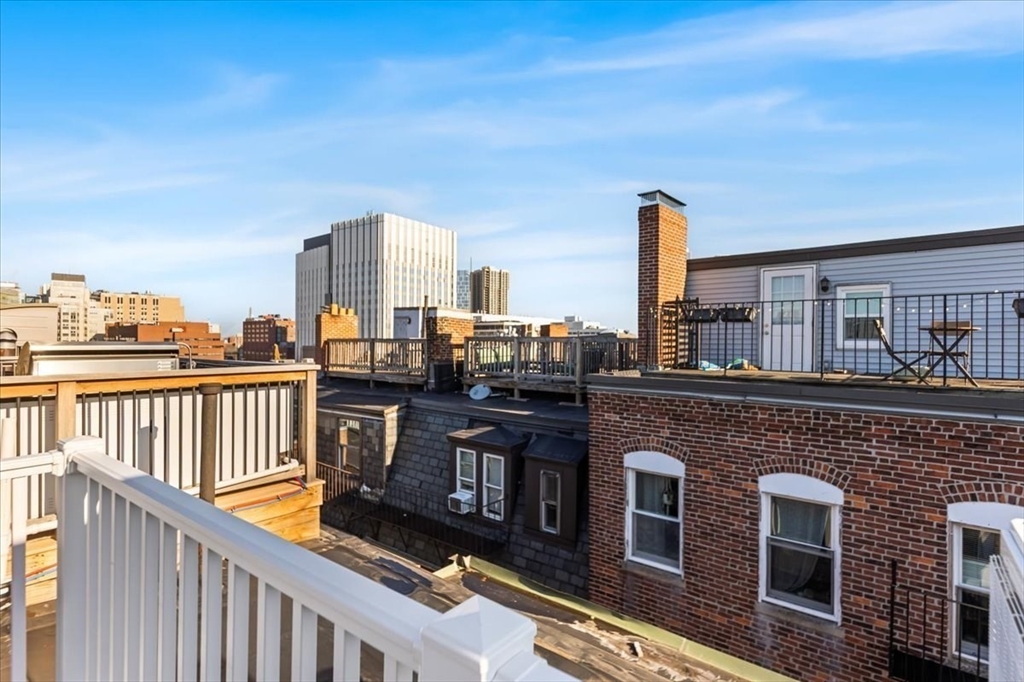 6 Goodwin Place, Unit 4 Boston, MA 02114 - Photo 19 of 24 a balcony with a city view