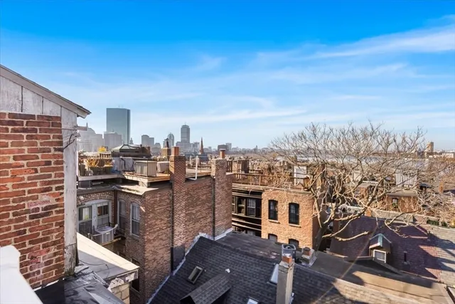 a view of a city with tall buildings