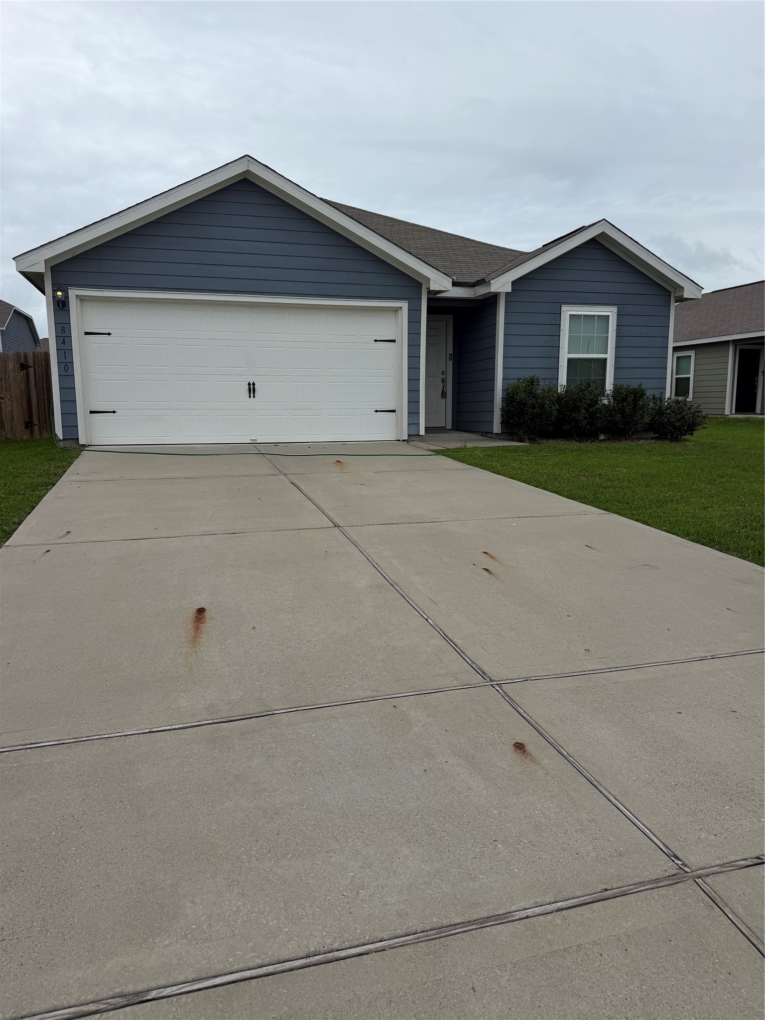 8410 Dusty Ridge Road Baytown, TX 77523 - Photo 2 of 18 a view of house with a garage