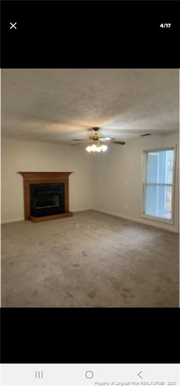 2009 Sardonyx Road, Unit 2 Fayetteville, NC 28303 - Photo 4 of 15 a view of an empty room and fire place
