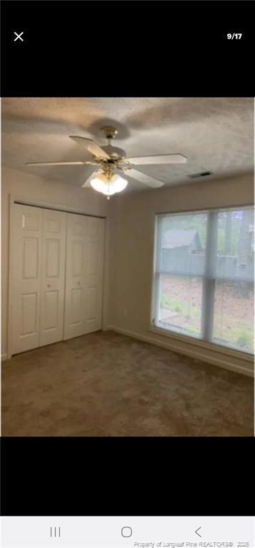 2009 Sardonyx Road, Unit 2 Fayetteville, NC 28303 - Photo 9 of 15 a view of an empty room with a window