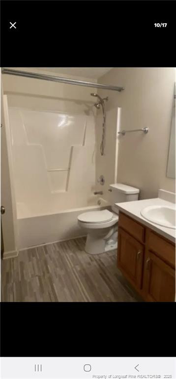 2009 Sardonyx Road, Unit 2 Fayetteville, NC 28303 - Photo 10 of 15 a bathroom with a sink a toilet and a mirror