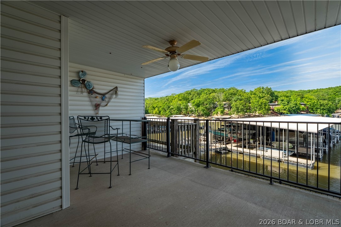 40 Lighthouse Road, Unit 5104 Lake Ozark, MO 65049 - Photo 28 of 36 Lowel Level Deck Walks Out to Dock