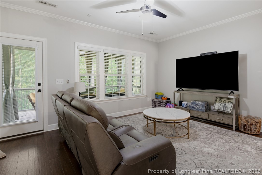 148 Heatherspring Way Spring Lake, NC 28390 - Photo 14 of 50 a living room with furniture and a flat screen tv