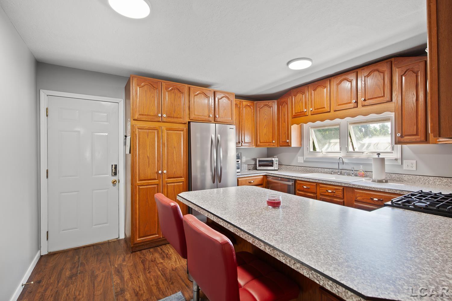 111 Spring Street Hudson, MI 49247 - Photo 11 of 39 50185551-2c70ecce-d6dd-48d5-8141-28dc5cfa47af.JPG