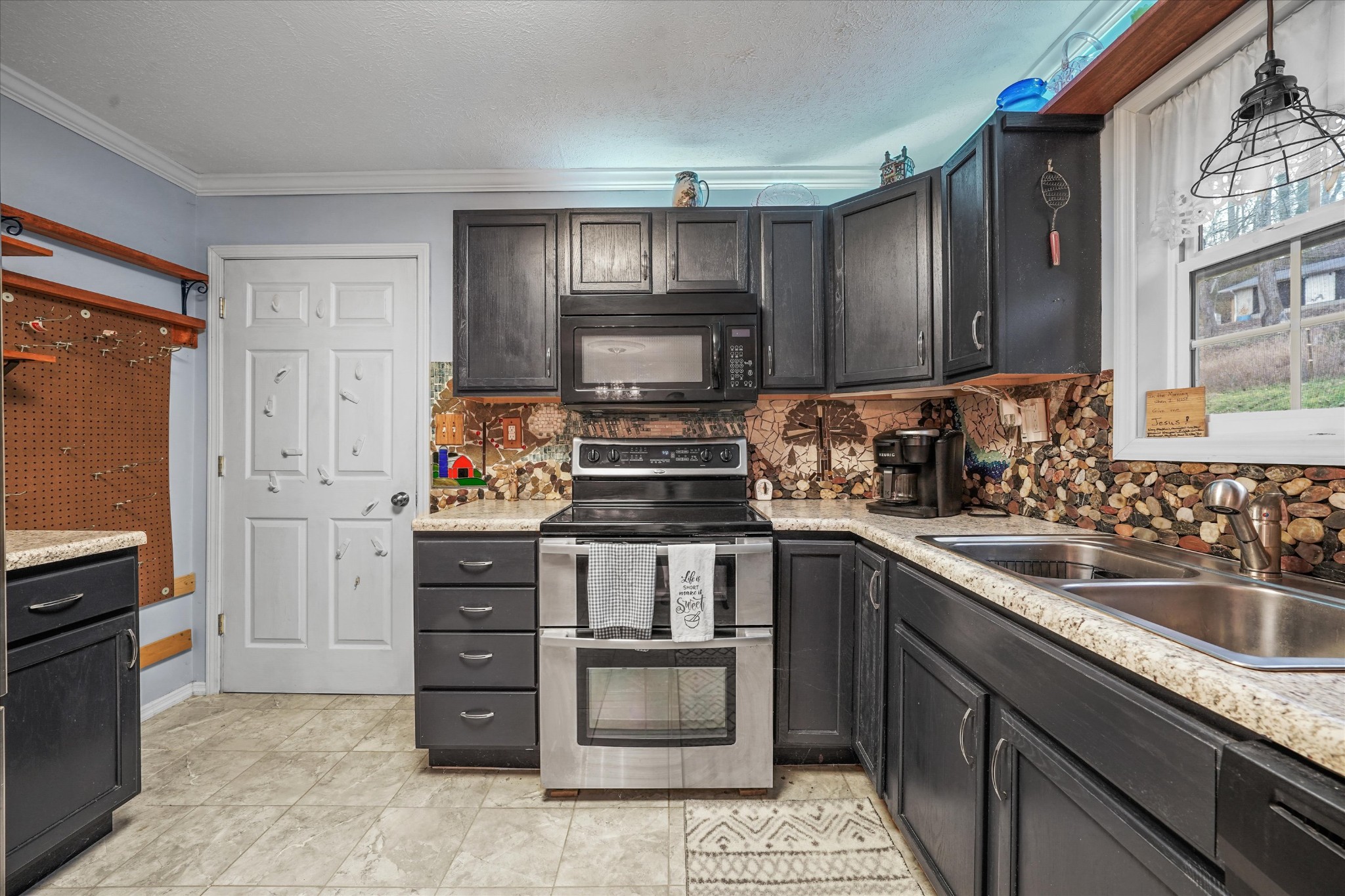 131 Scott Road Harriman, TN 37748 - Photo 17 of 51 a kitchen with a sink stove and refrigerator