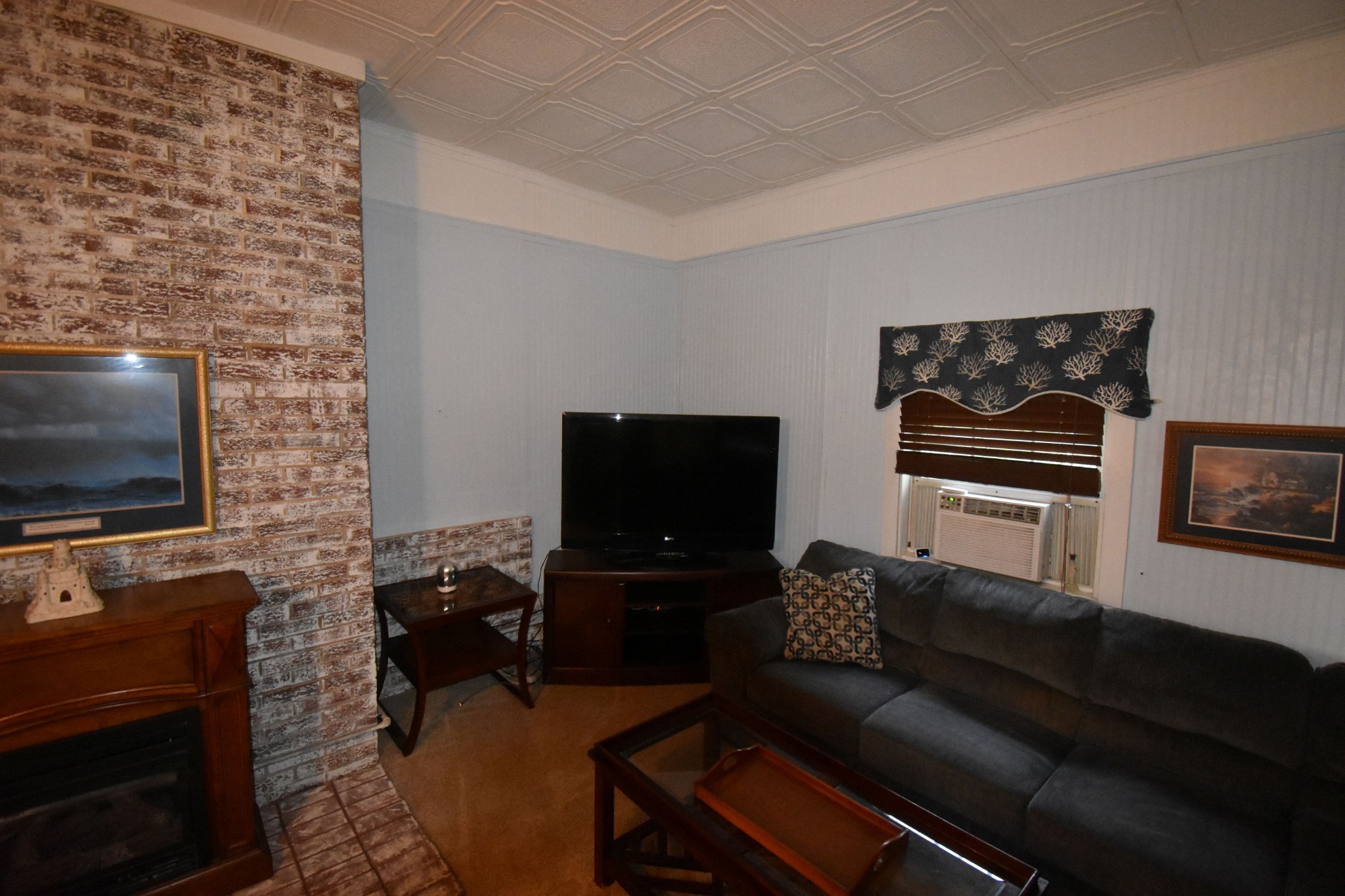 131 Scott Road Harriman, TN 37748 - Photo 3 of 51 a living room with furniture and a flat screen tv