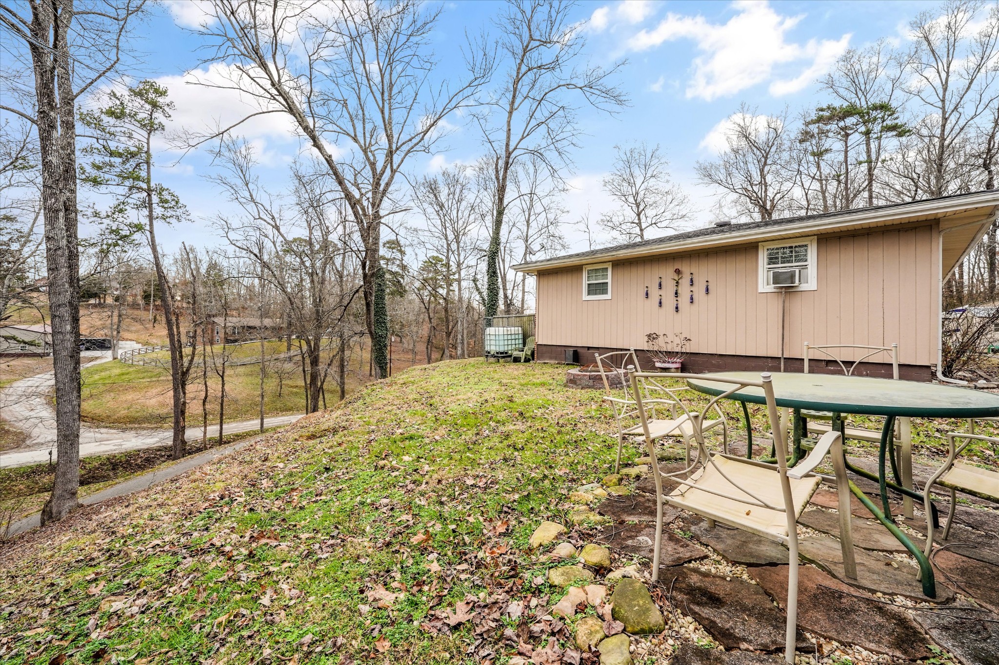 131 Scott Road Harriman, TN 37748 - Photo 44 of 51 a backyard of a house with table and chairs