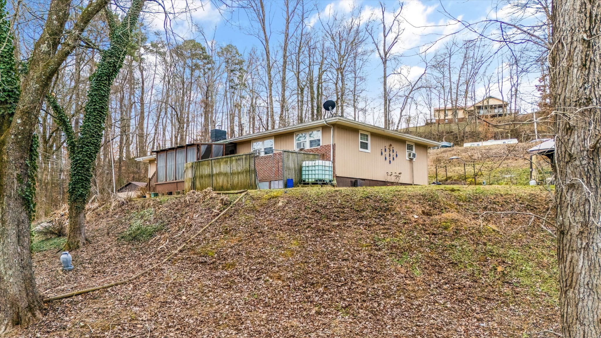 131 Scott Road Harriman, TN 37748 - Photo 48 of 51 a house that has a tree in it