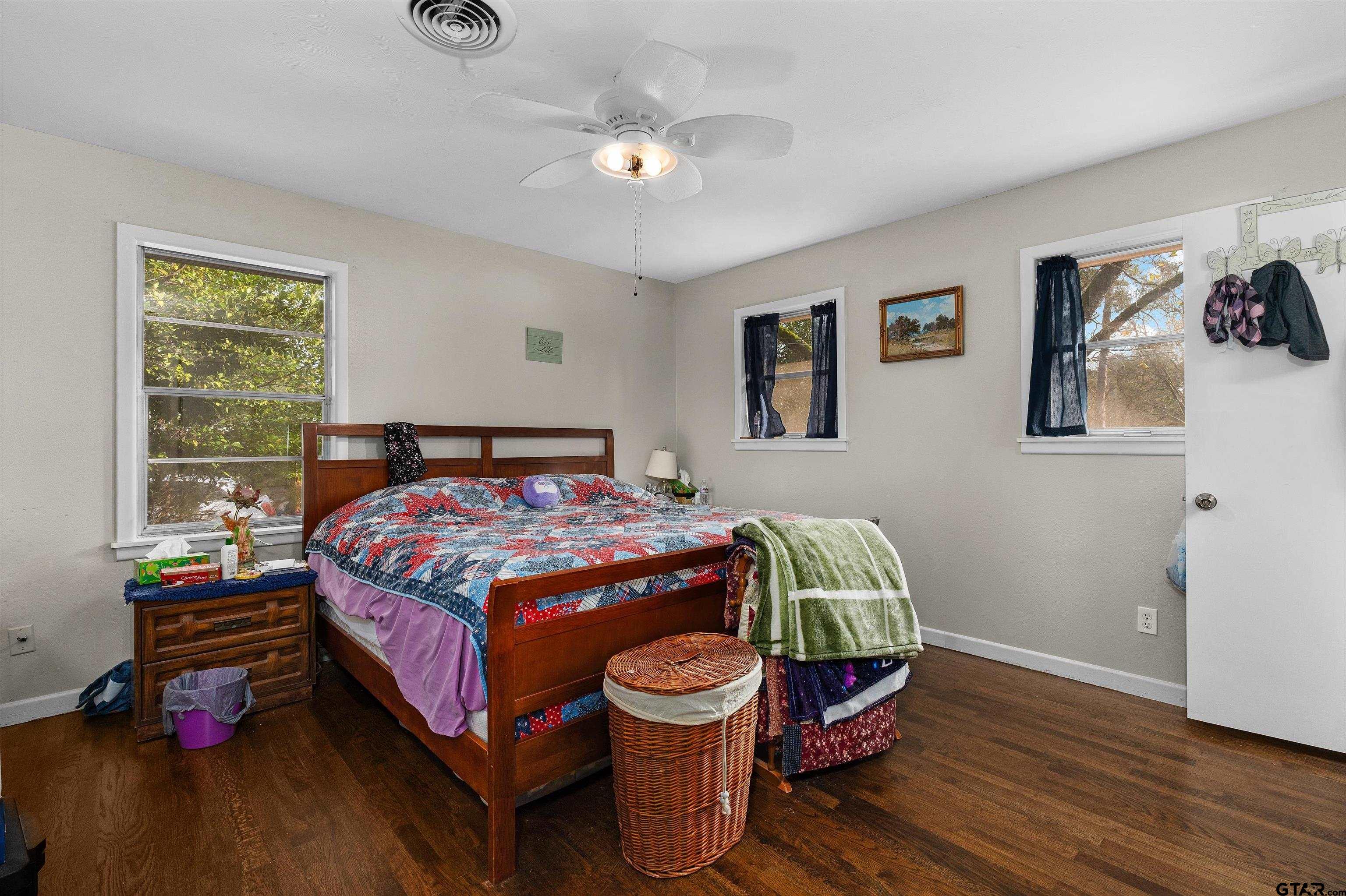 387 Hill Avenue Rusk, TX 75785 - Photo 20 of 26 a bedroom with a bed and a window