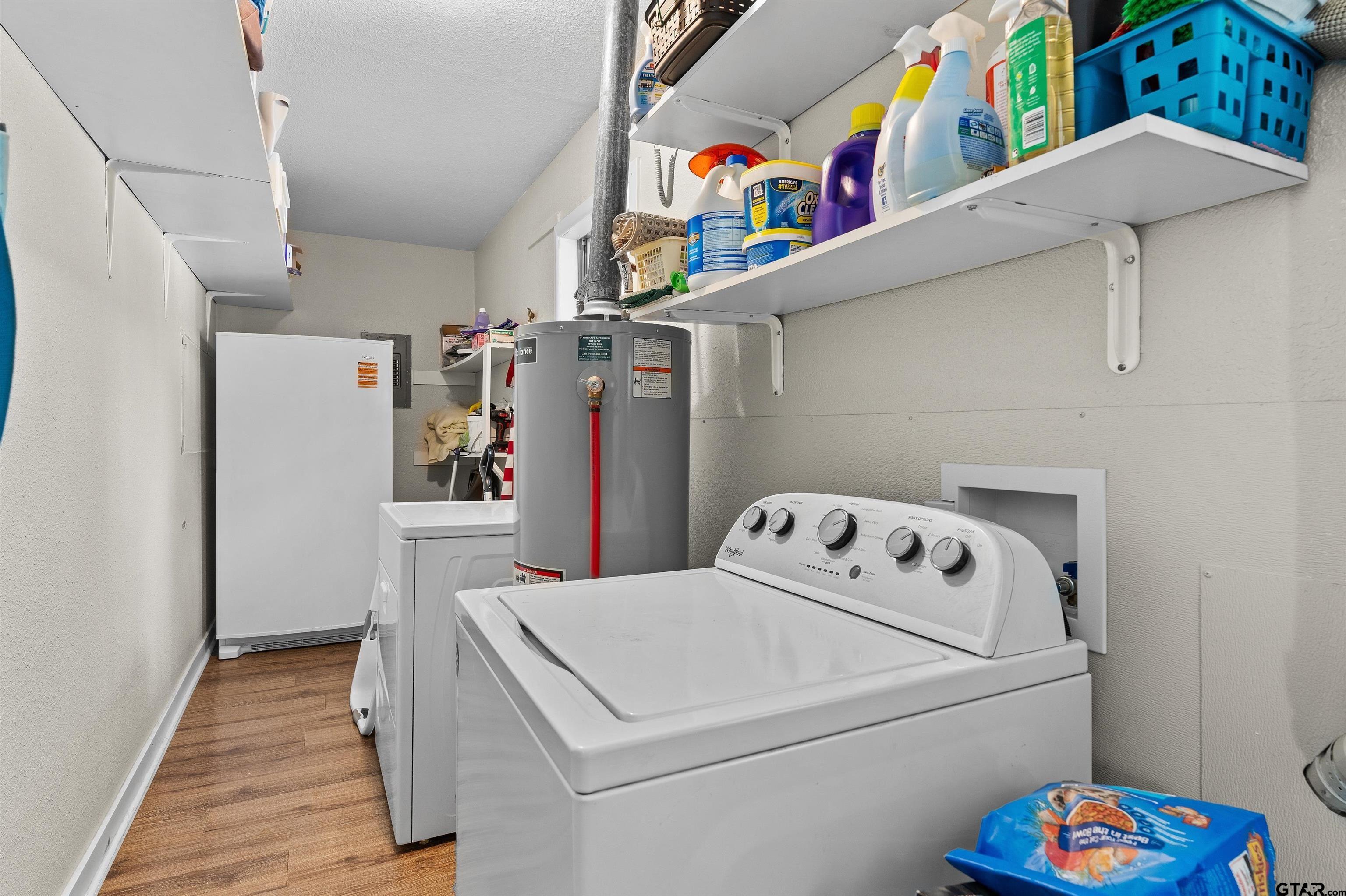 387 Hill Avenue Rusk, TX 75785 - Photo 22 of 26 a utility room with dryer and washer