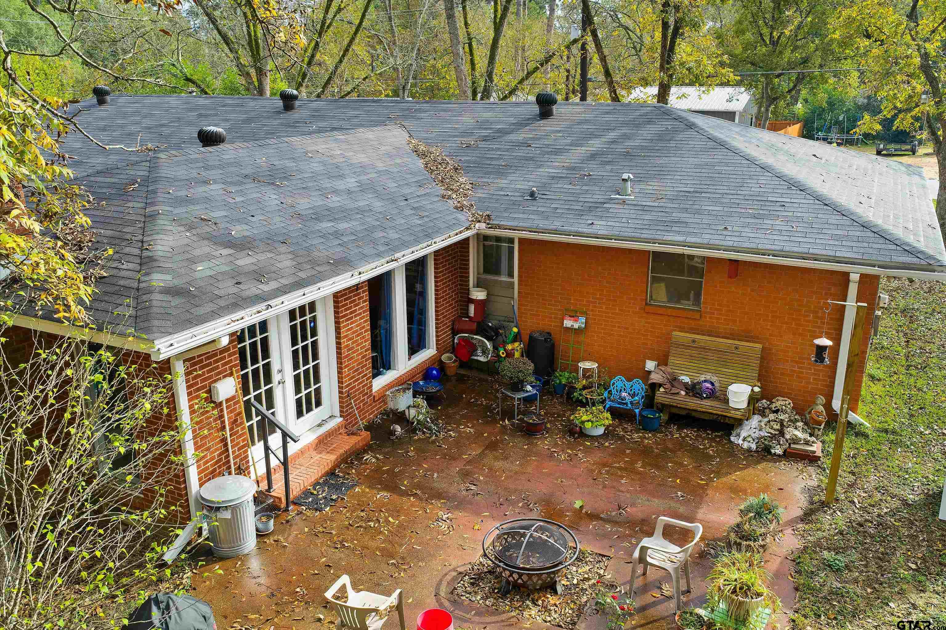 387 Hill Avenue Rusk, TX 75785 - Photo 26 of 26 a backyard of a house with outdoor seating