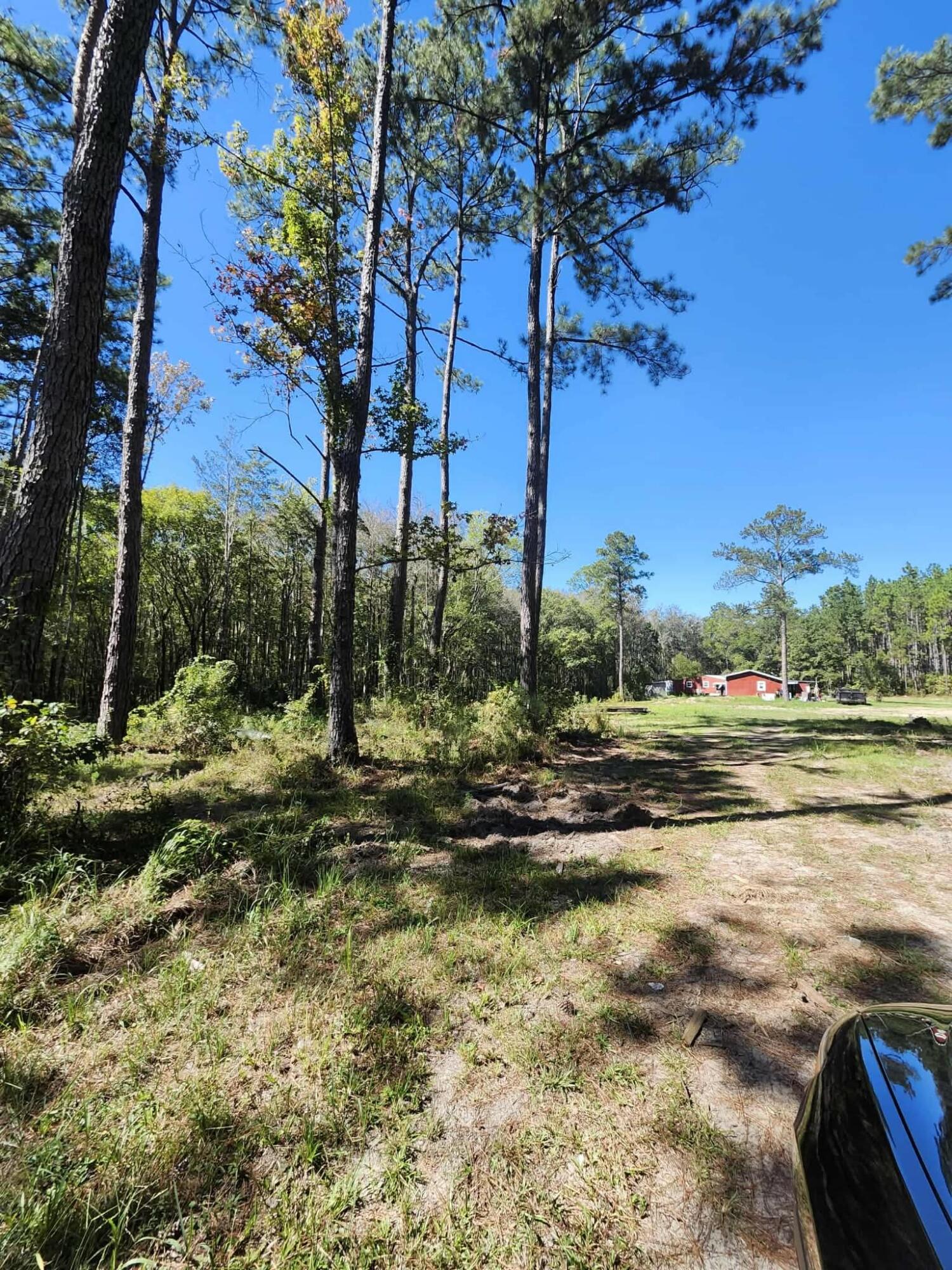 402 Smokehouse Lake Road Ponce de Leon, FL 32455 - Photo 11 of 13 a view of a lake with houses