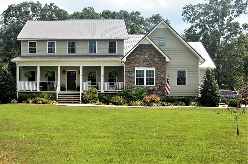 1233 Post Oak Road Belvidere, TN 37306 - Photo 1 of 30 Welcome to 1233 Post Oak Road. Wonderful Hardie board siding that's rated the same as brick. 50 year warranty on the standing seam metal roof.