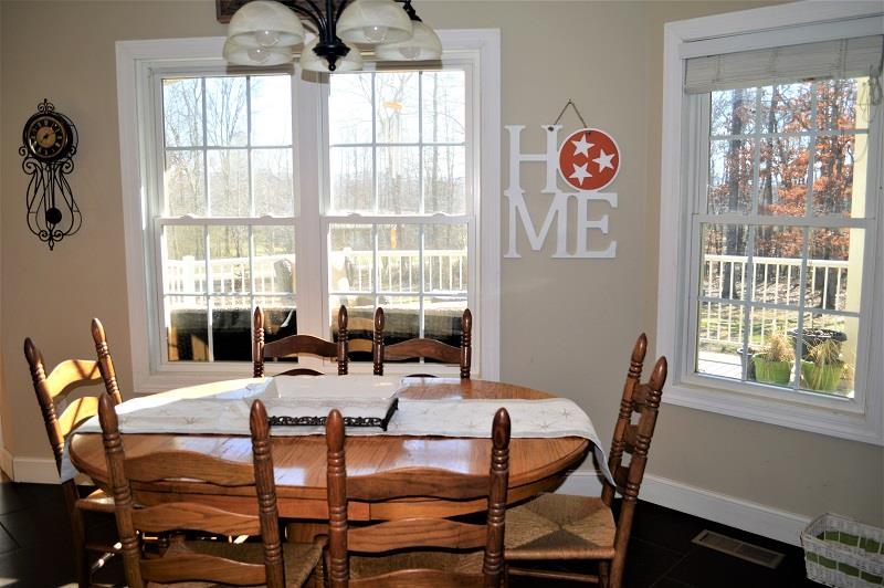 1233 Post Oak Road Belvidere, TN 37306 - Photo 12 of 30 Huge breakfast nook with awesome views of the back. You have to see the Italian tile floor in the kitchen.