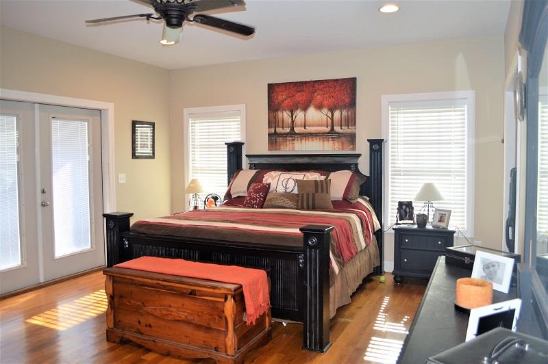 1233 Post Oak Road Belvidere, TN 37306 - Photo 13 of 30 The 18x15 master bedroom has it's own private access to the back deck and you have to see the enormous walk-in and dress closet.