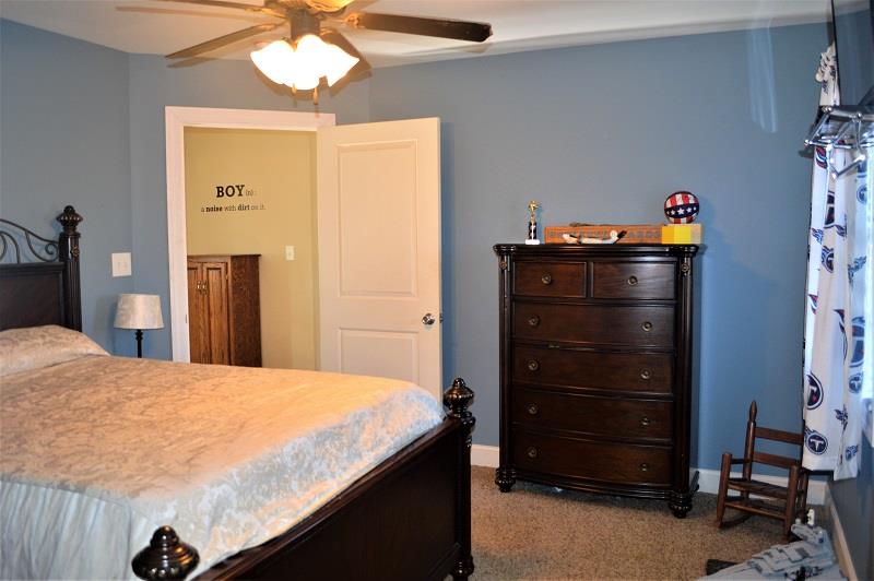 1233 Post Oak Road Belvidere, TN 37306 - Photo 16 of 30 This is the 12x13 bedroom 2 with it's own bath room. All the bedrooms have walk-in closets.