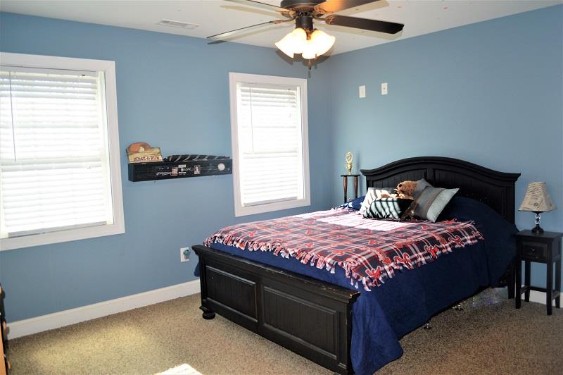 1233 Post Oak Road Belvidere, TN 37306 - Photo 17 of 30 This is the 14x12 bedroom 3 that shares the unique Jack and Jill bath with bedroom 4.