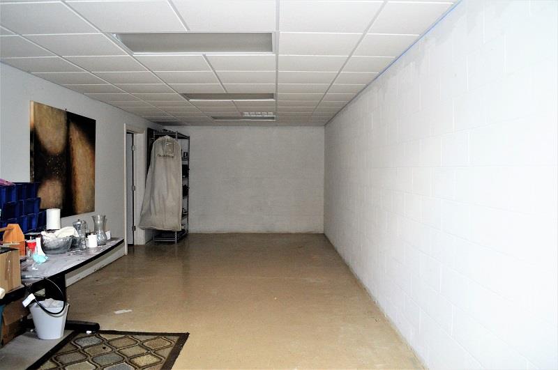 1233 Post Oak Road Belvidere, TN 37306 - Photo 23 of 30 The 33x12 office in the basement that could be a 6th bedroom or would make an great man cave.