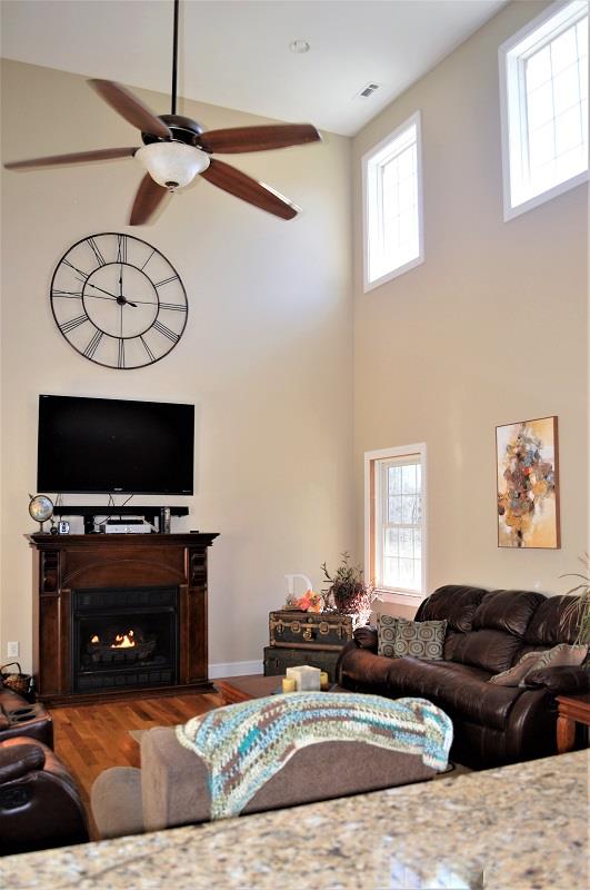 1233 Post Oak Road Belvidere, TN 37306 - Photo 6 of 30 The 18x19 living room has high ceilings with lots of windows for loads of natural light.