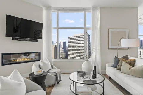 a living room with furniture and a flat screen tv