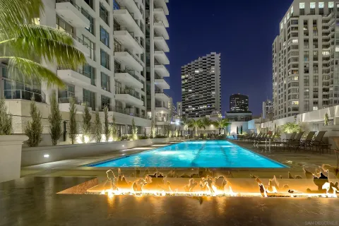 a view of swimming pool from a balcony