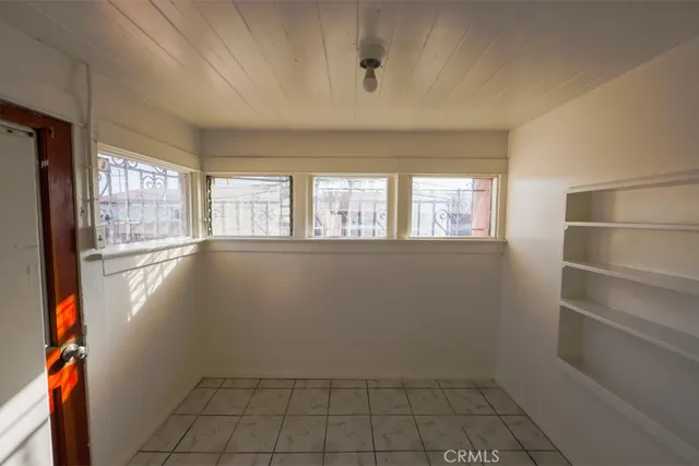 a view of an empty room and window