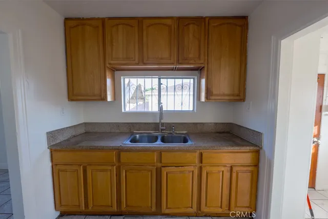 a bathroom with a sink and a window