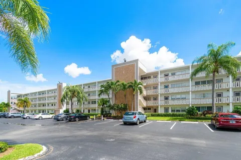 a parked cars parked in front of a building