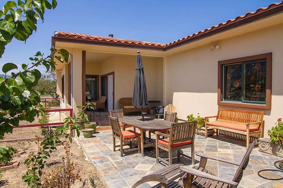 10075 Ojai Santa Paula Road Ojai, CA 93023 - Photo 15 of 17 a view of a chairs and table in a patio