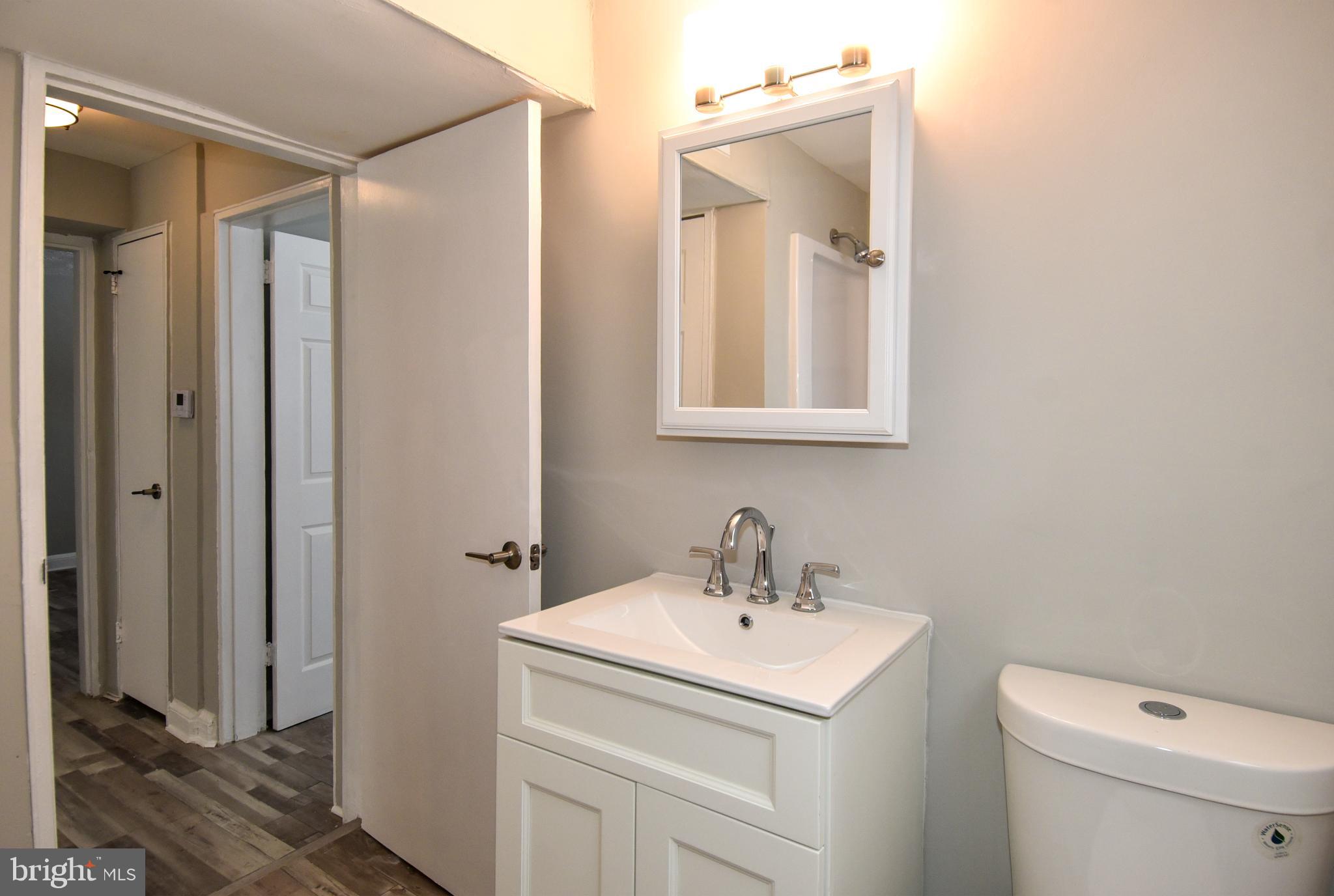 8208 Bellefonte Lane, Unit 5 Clinton, MD 20735 - Photo 17 of 17 Modern bathroom with sleek fixtures.